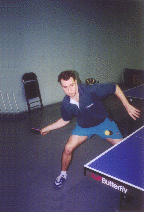 Todd has bent his knees, especially his right one