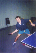 Todd's right leg straightens out, beginning his body rotation into the ball